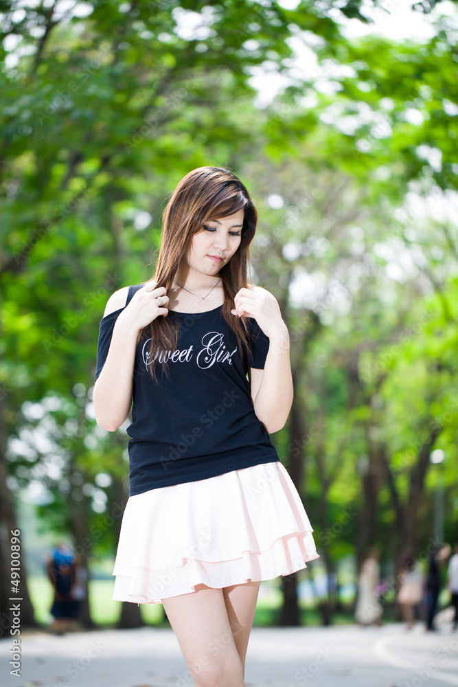 Portrait of young beautiful woman in the park Portrait of young beautiful woman in the park