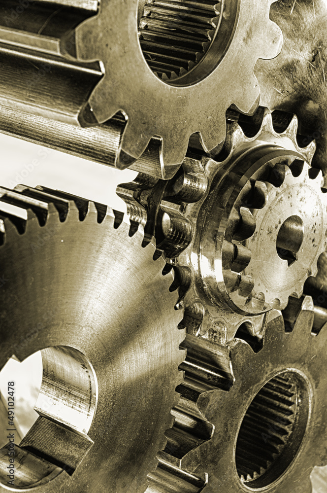gears and coigs in old fashioned brownish look gears and coigs in old fashioned brownish look