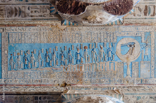 Ancient Egyptian hieroglyphs and carved paintings in Dendera photo