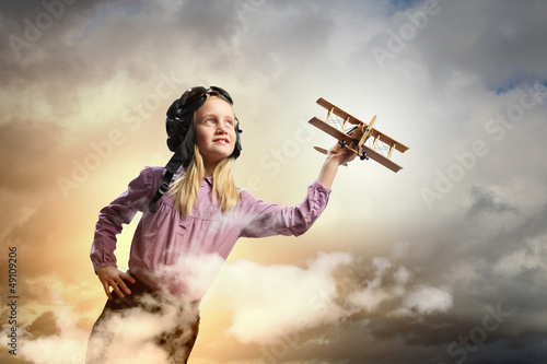 Little girl in pilot's hat