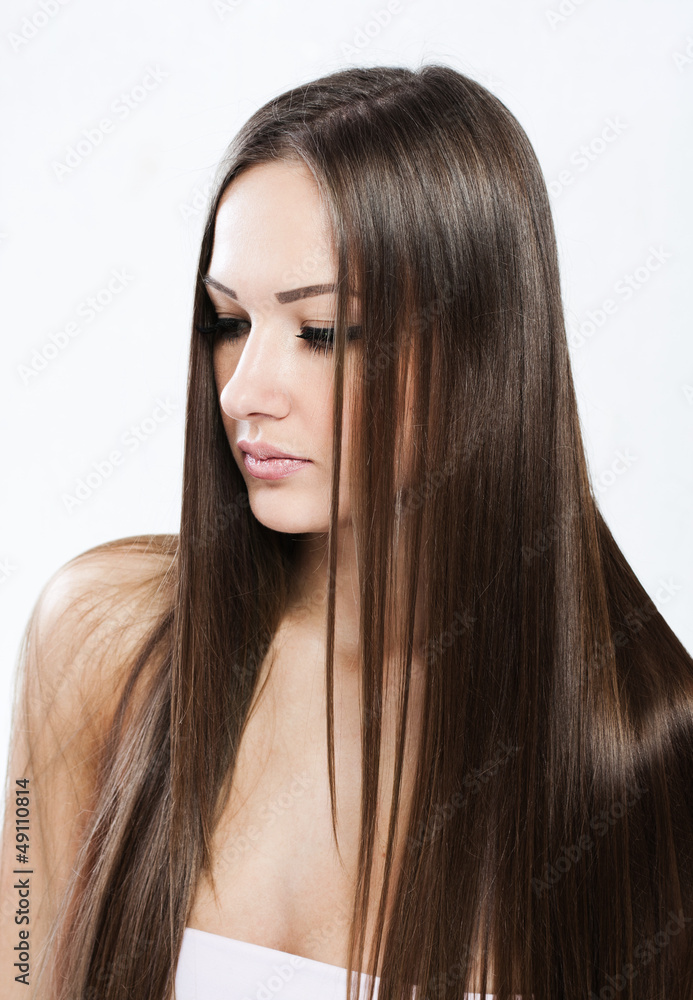Naklejka premium Beautiful Woman with Healthy Long Hair