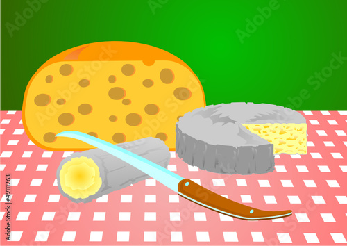 Three cheeses and a knife, ready for tasting