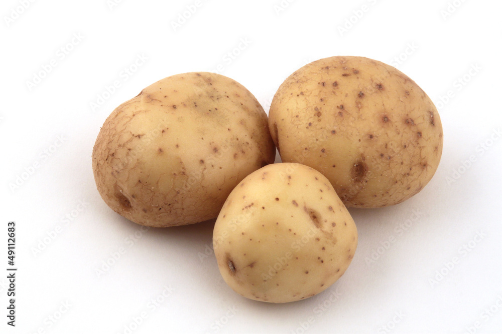 Close up of potatoes on a white background. Close up of potatoes on a white background.