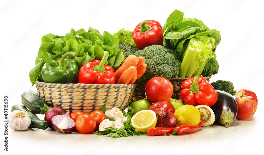 raw vegetables in wicker basket isolated on white raw vegetables in wicker basket isolated on white