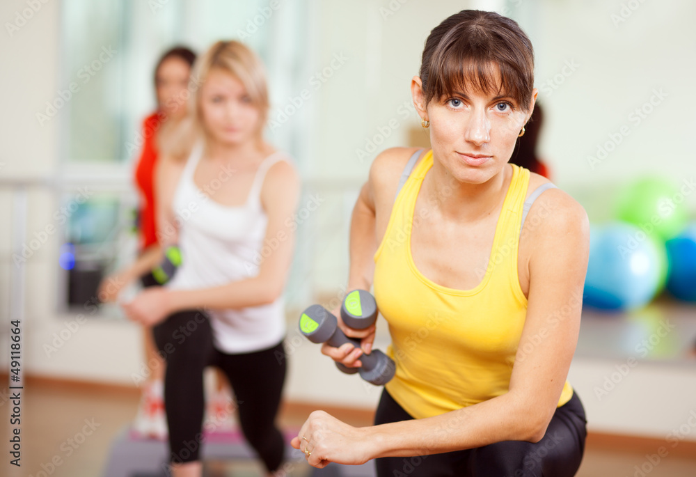 Group training in a fitness class Group training in a fitness class