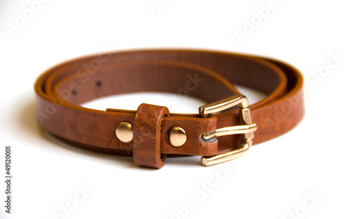 brown leather belt on a white background