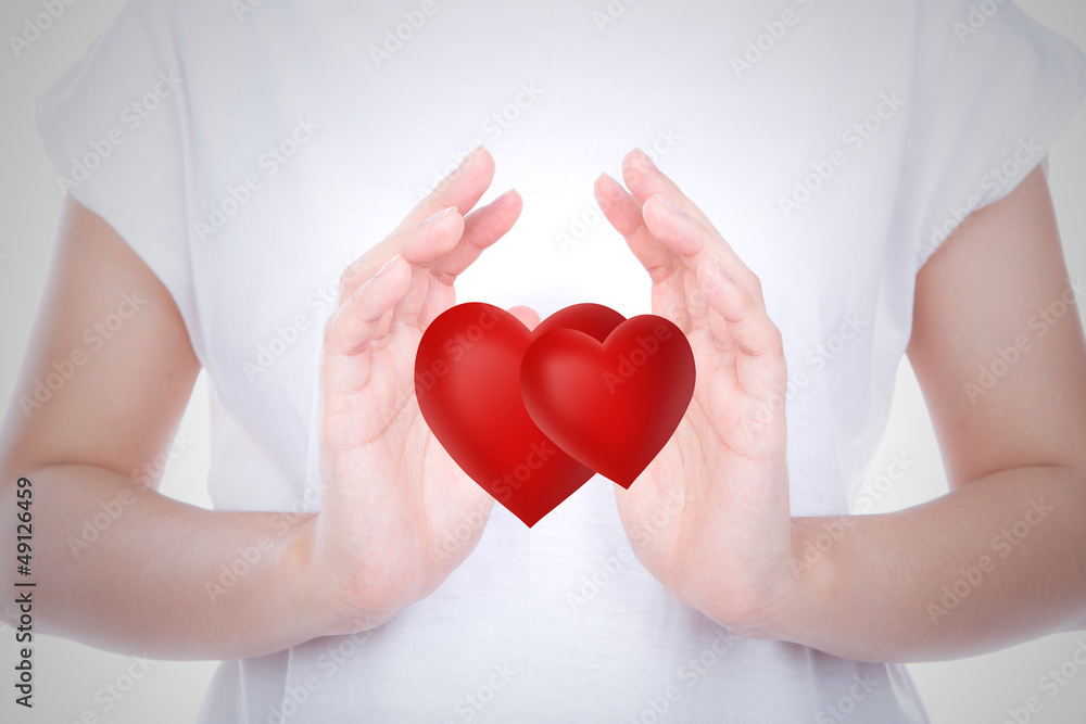Heart on woman hands over body Heart on woman hands over body