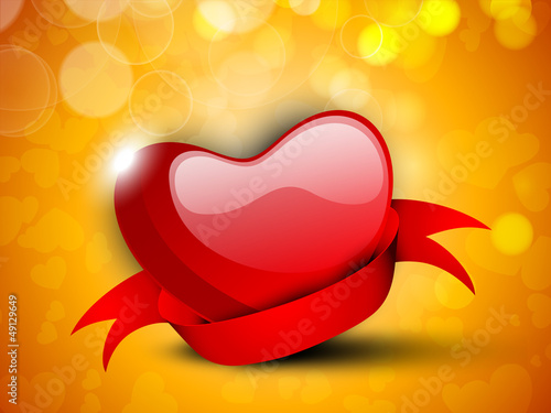 Happy Valentine's Day background with glossy red heart with ribb