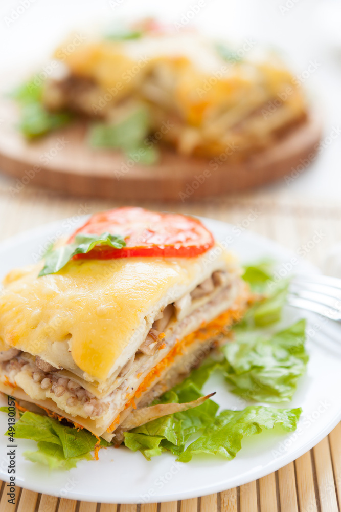 vegetable lasagna on lettuce leaf