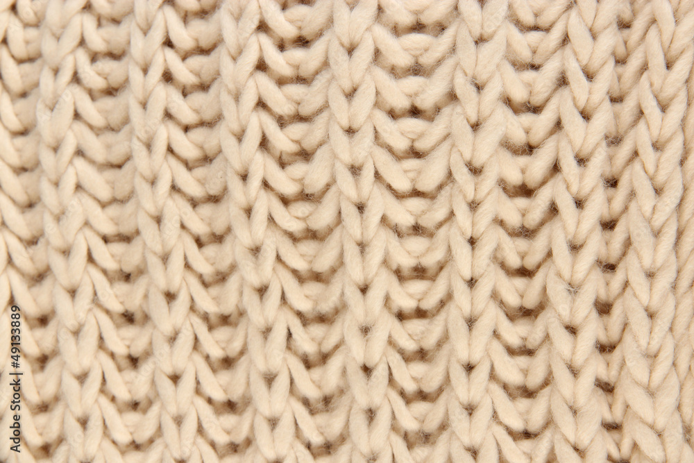 Warm knitted scarf close-up background Warm knitted scarf close-up background