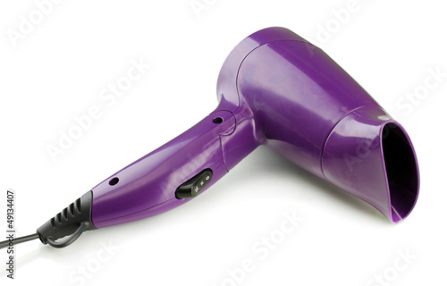 Hair dryer on purple background