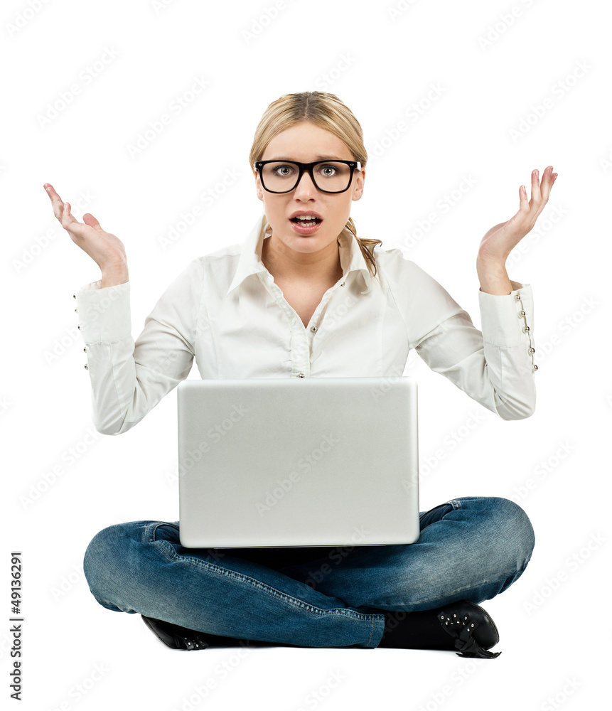 Surprised woman sitting with laptop Surprised woman sitting with laptop