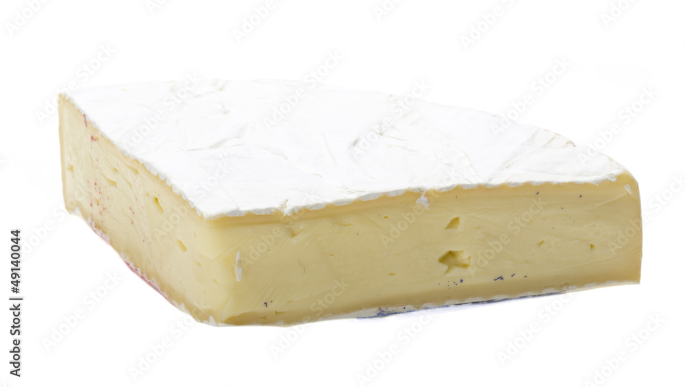 A piece of soft brie cheese