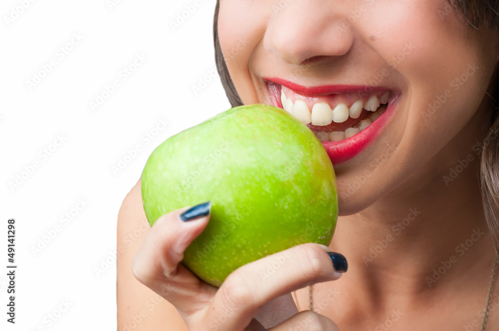 Biting a green apple Biting a green apple