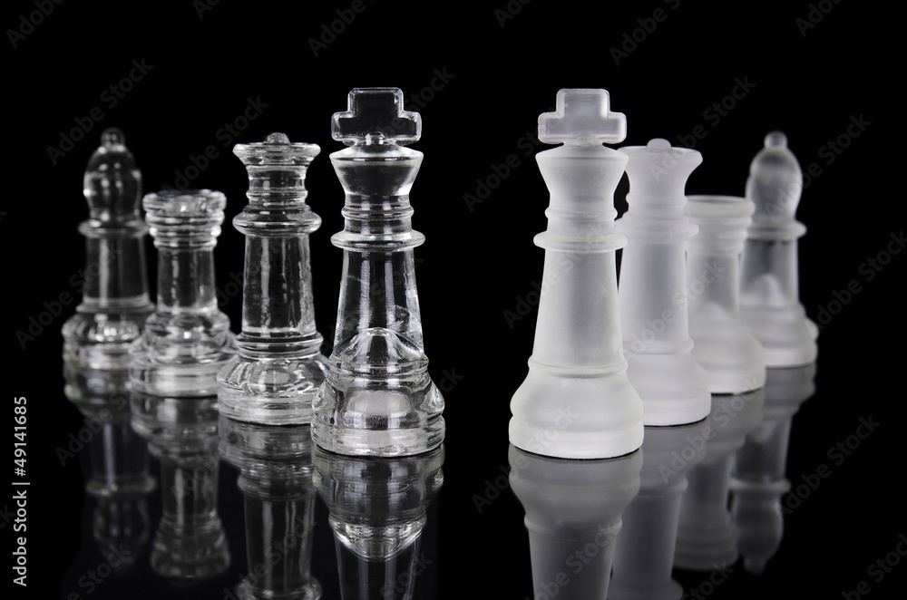 Chess pieces isolated on black background. Chess pieces isolated on black background.