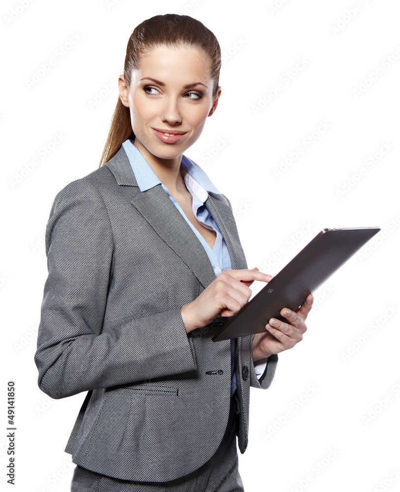 Businesswoman standing in hall with electronic pad Businesswoman standing in hall with electronic pad