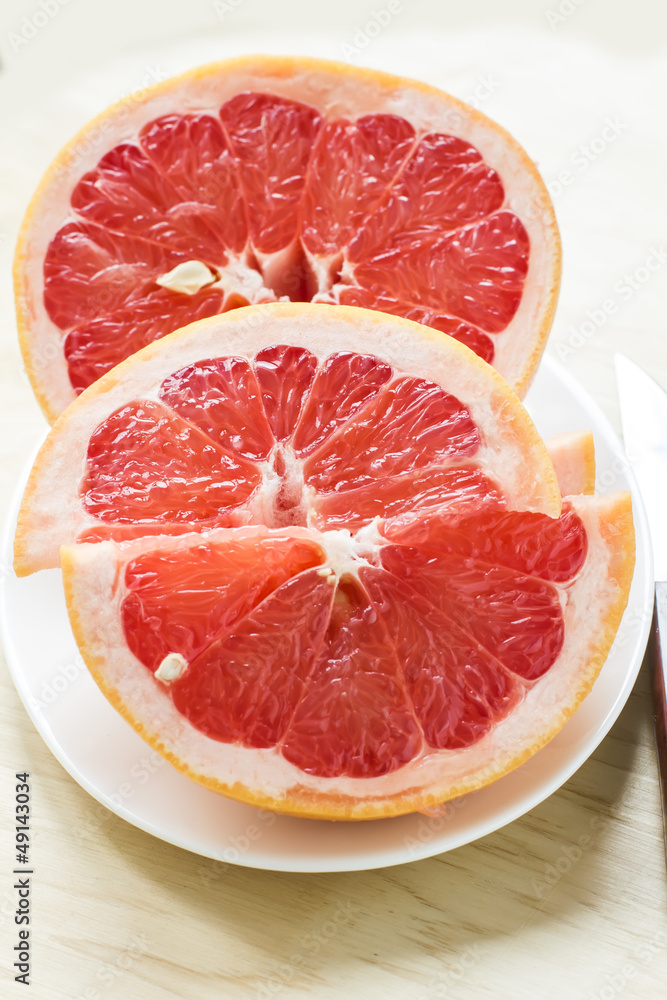 Fresh grapefruit on plate