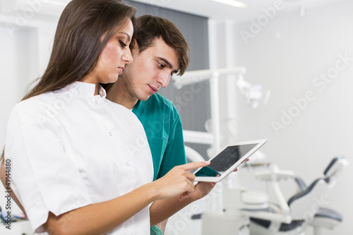 Dentists with tablet