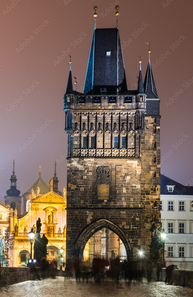 stare Mesto Tower from the Charles Bridge at night, Prague.