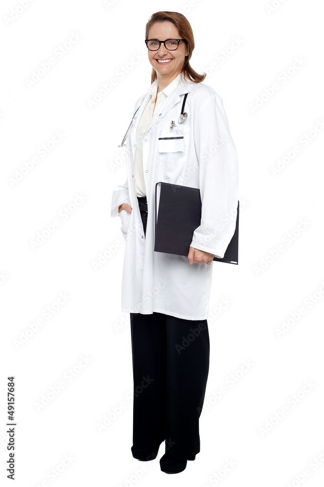 Smiling lady doctor with medical file in hand Smiling lady doctor with medical file in hand