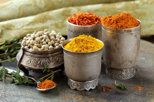 various spices (turmeric, paprika, saffron, coriander)