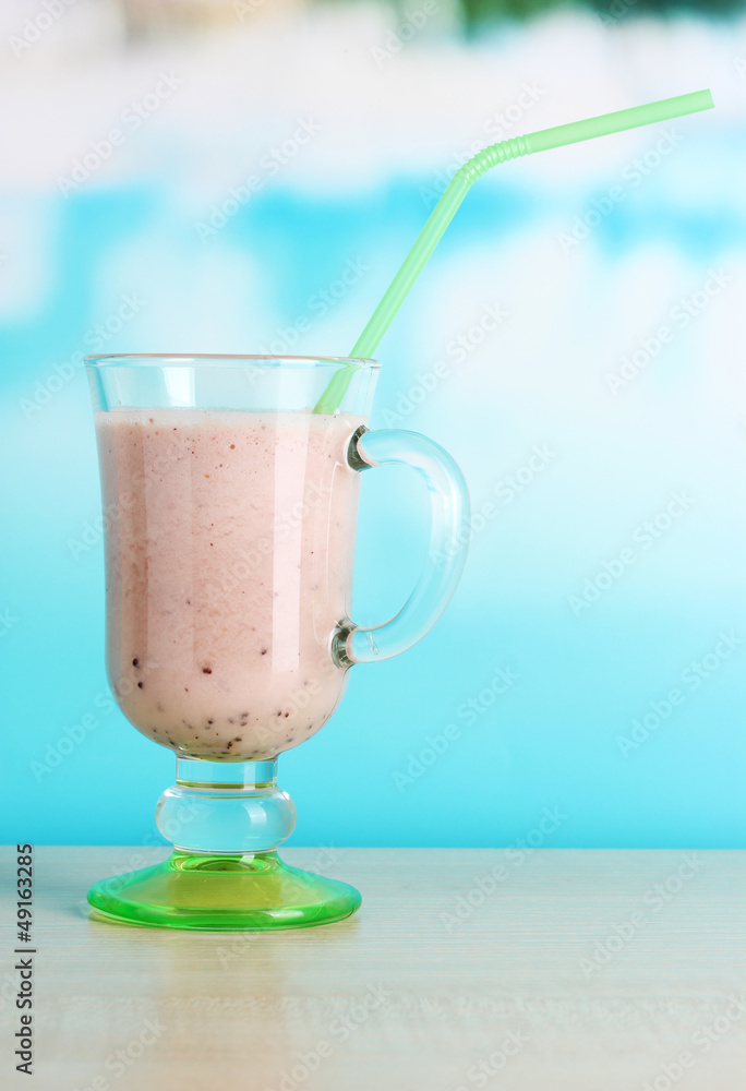 Cream cocktail on brightblue background