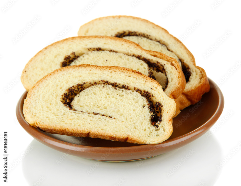 Loaf with poppy seeds on color plate, isolated on white Loaf with poppy seeds on color plate, isolated on white