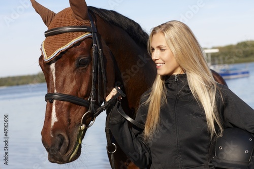 Closeup portrait of rider and horse