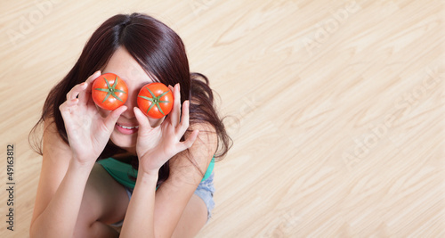Tomato. funny girl showing tomatos