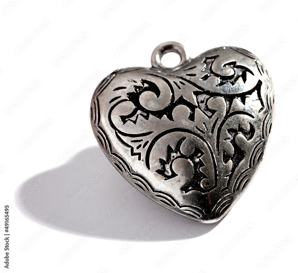 Fototapeta Ornate silver heart shaped locket