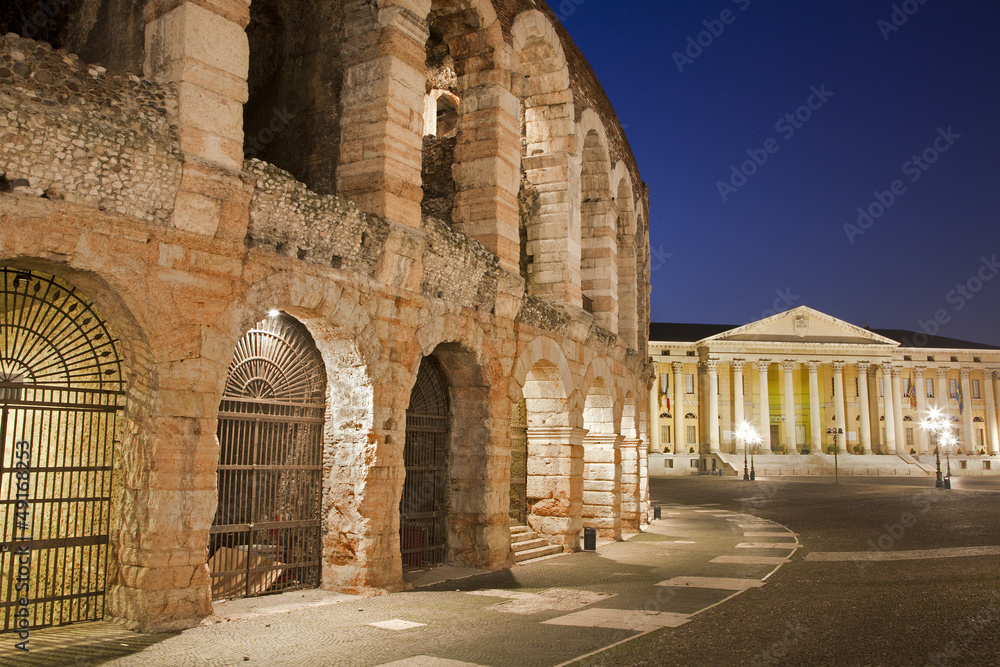 Verona - Arena and Comune di Verona building in dusk