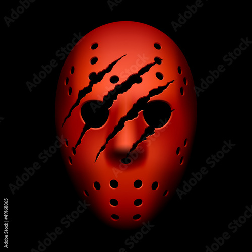 Red hockey mask with traces of claws photo