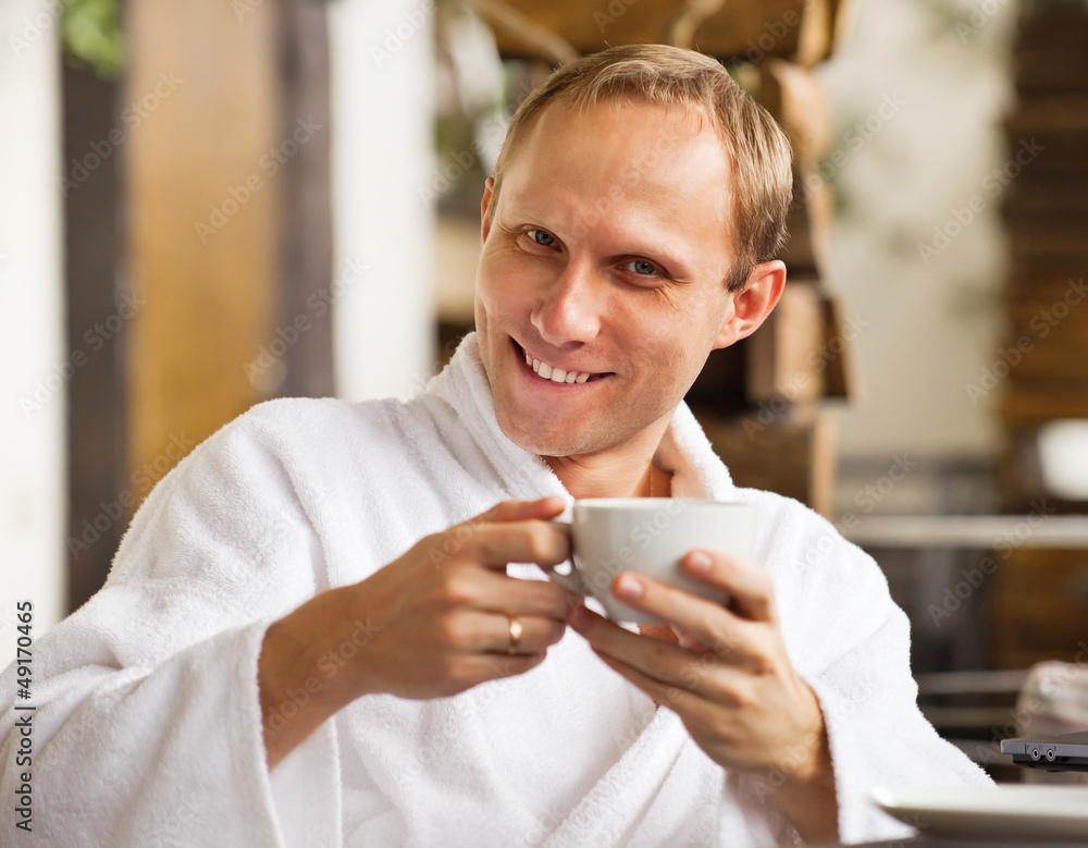 Close up portrait cheerful man with coffee cup Close up portrait cheerful man with coffee cup