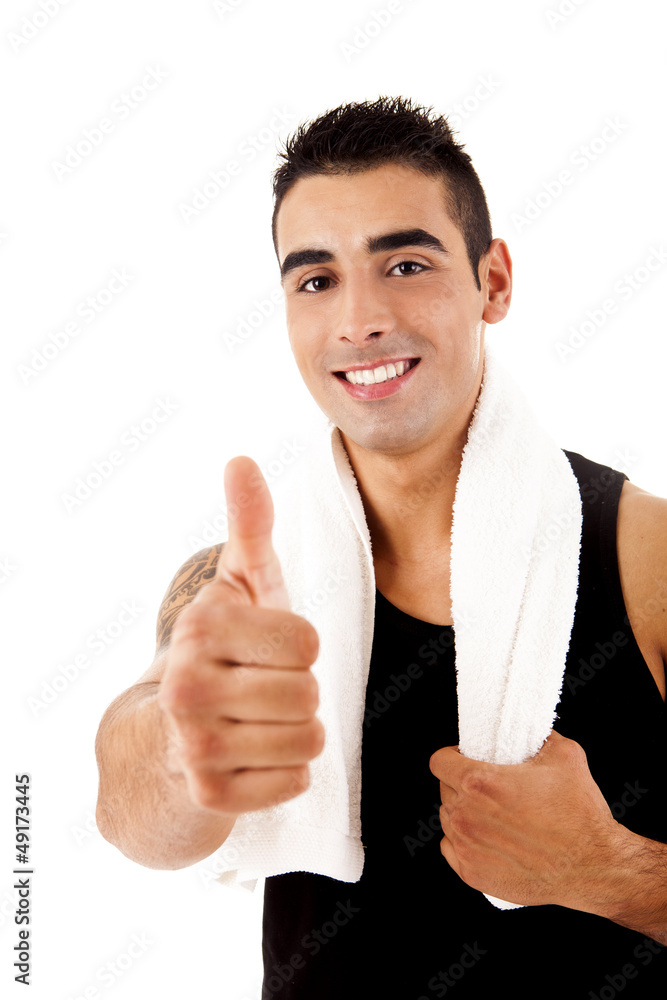 Beautiful fitness instructor doing thumbs up Beautiful fitness instructor doing thumbs up