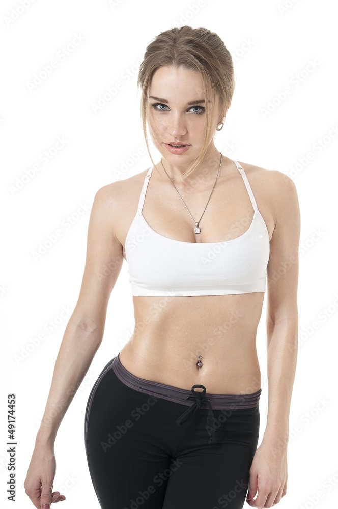 Beautiful happy athletic girl measuring perfect the waist. Beautiful happy athletic girl measuring perfect the waist.