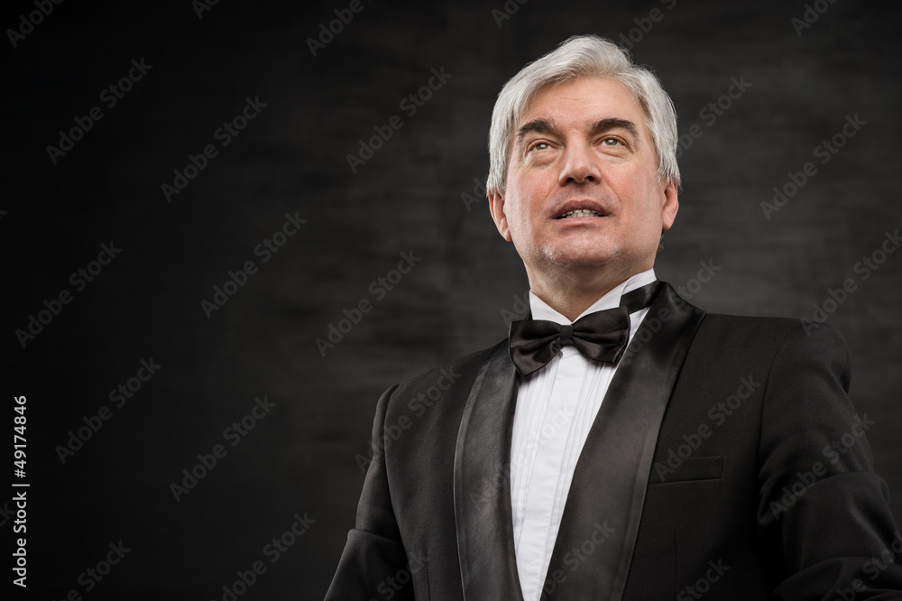 Portrait of a successful mature business man smiling - Copyspace Portrait of a successful mature business man smiling - Copyspace