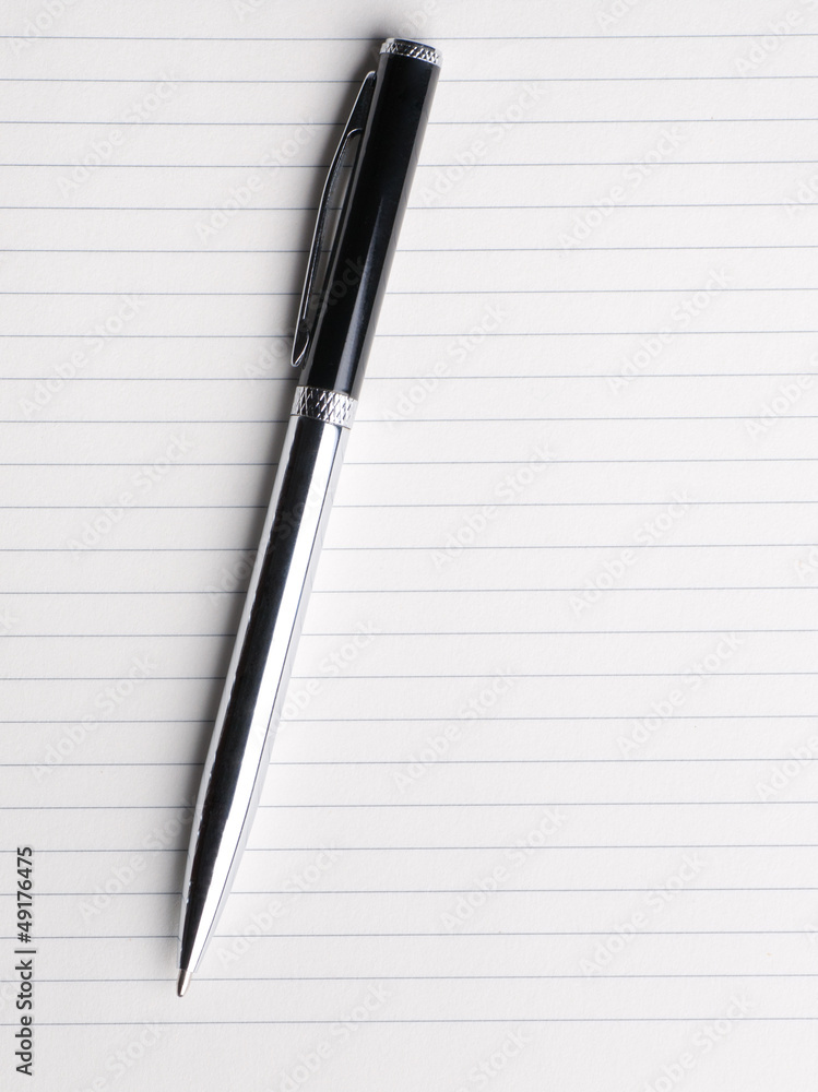 Blank notebook paper with pen. isolated on white. Blank notebook paper with pen. isolated on white.