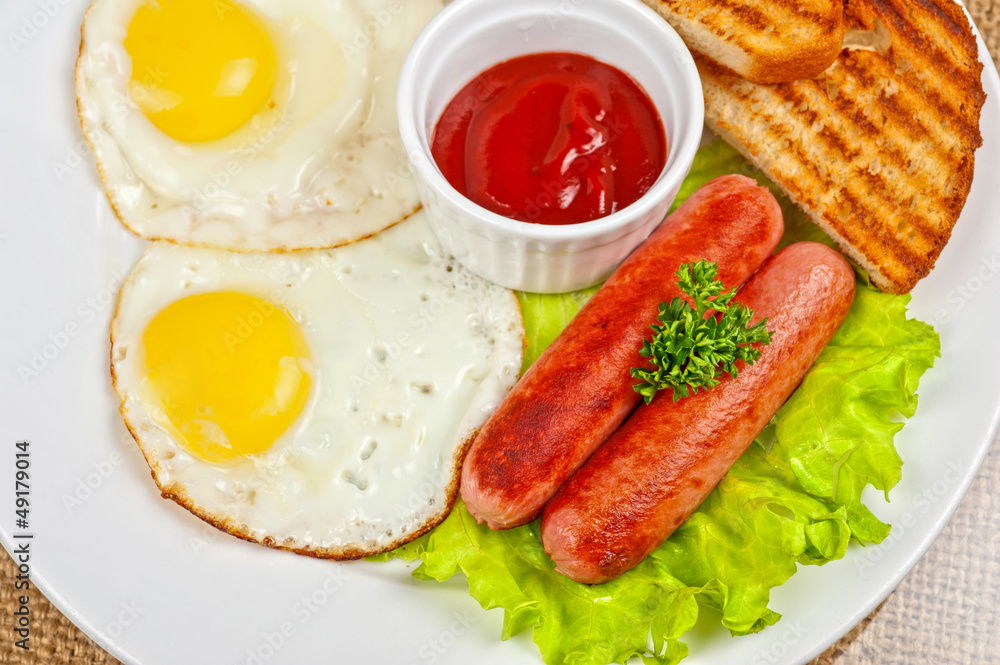 Fried eggs with sausages Fried eggs with sausages