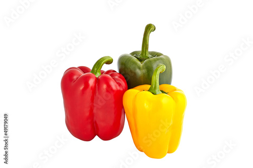 Three sweet peppers in red, yellow and green color