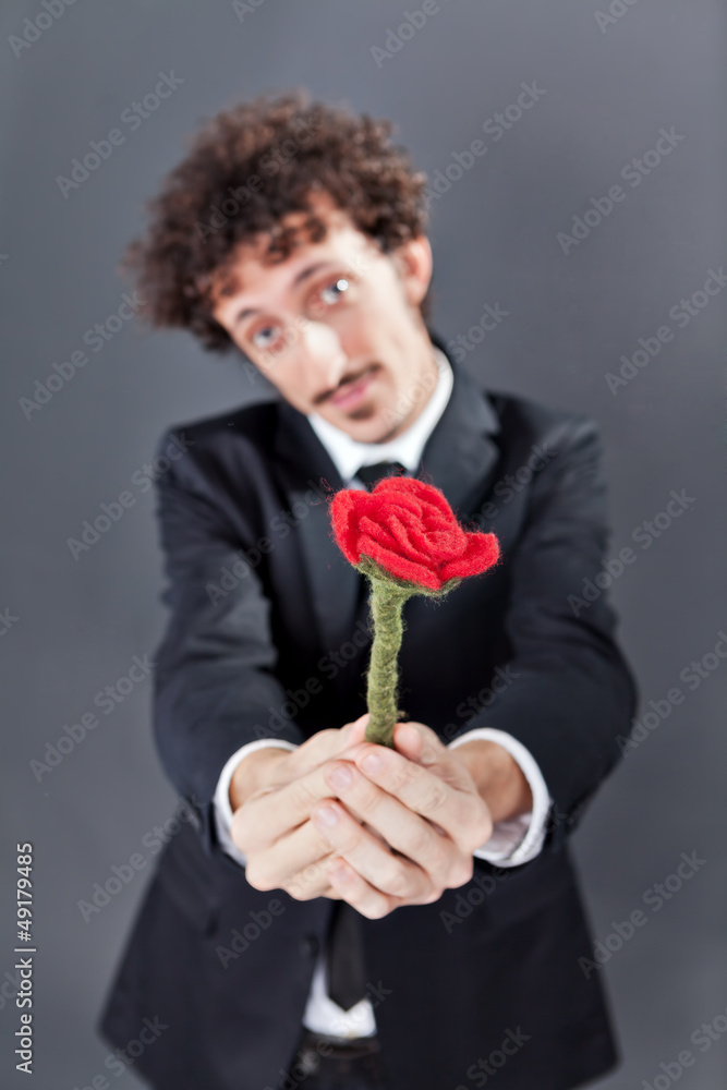 Man giving fabric rose