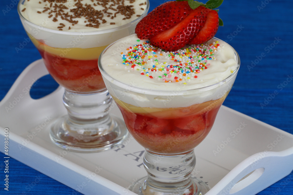 Strawberry trifle on blue background