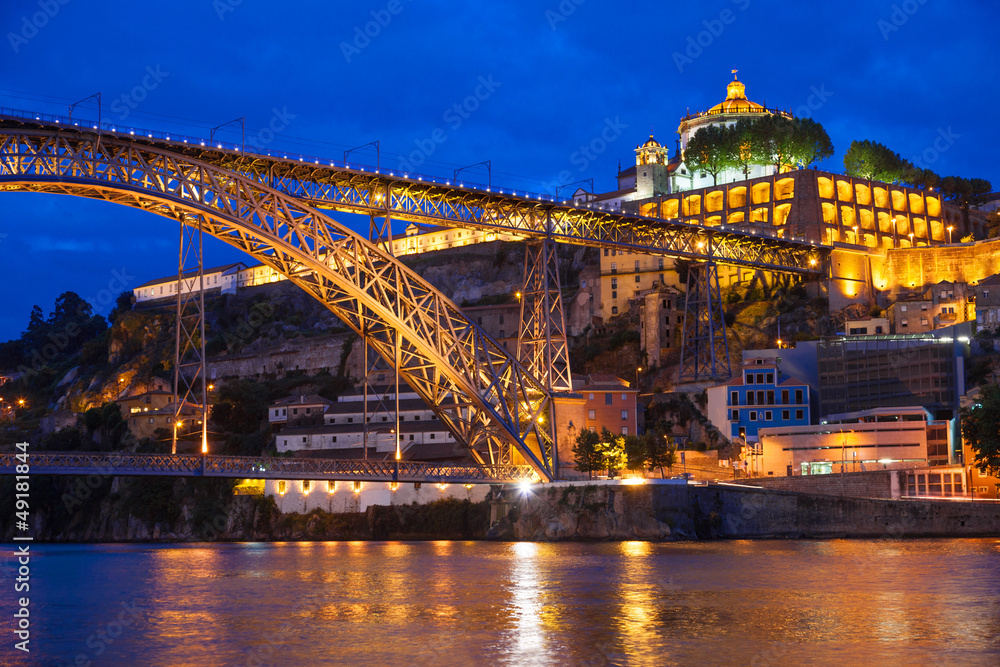 Dom Luis I bridge over Douro river at night. Porto, Portugal