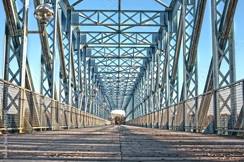 Old blue train bridge photo
