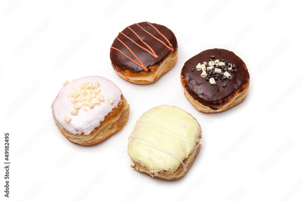 Iced donut's isolated on a white studio background. Iced donut's isolated on a white studio background.