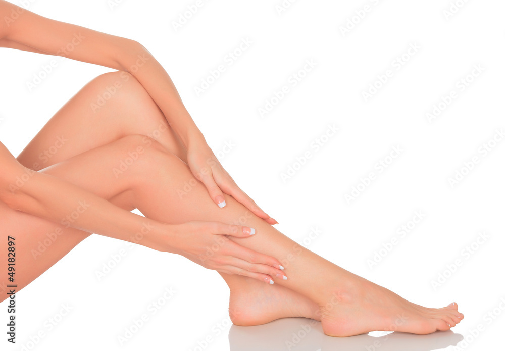 Perfect long female legs against white background Perfect long female legs against white background