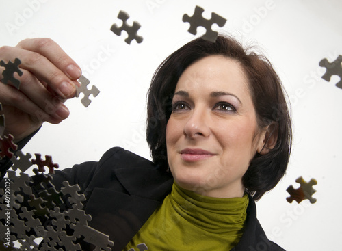 Woman Working a Jigsaw Puzzle