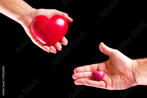 Heart on the palm as love and health symbol