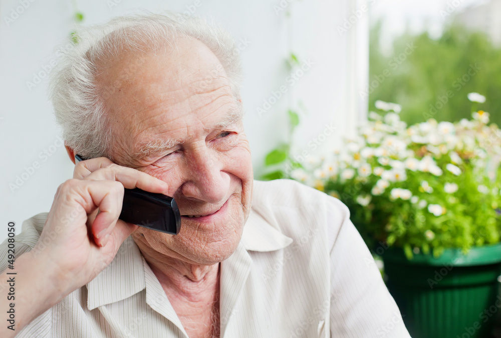 Old Man Enjoying a Telephone Conversation Old Man Enjoying a Telephone Conversation