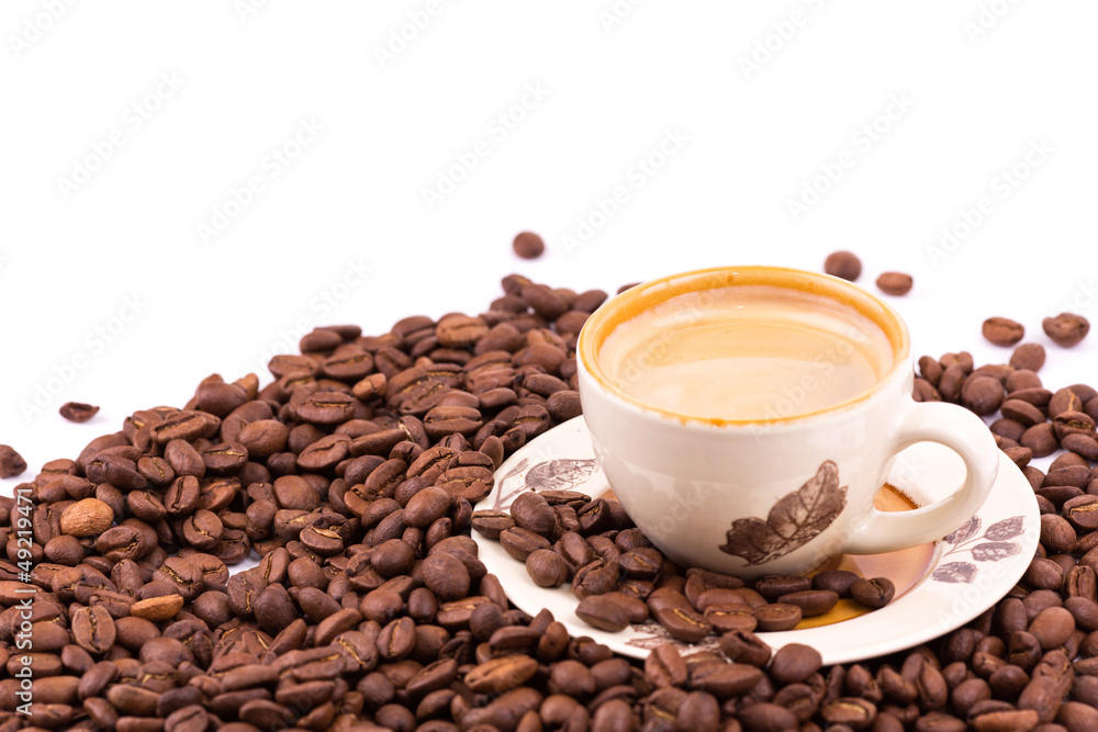 Fototapeta premium Coffee beans and cup of coffee background
