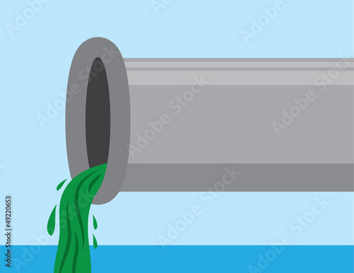 Pipe with sludge pouring out into water